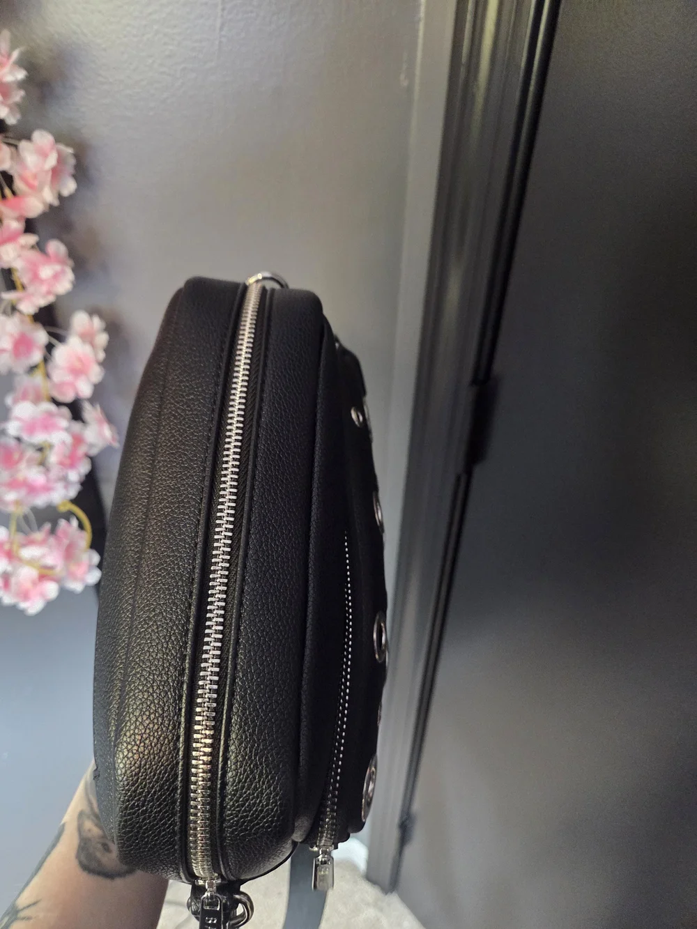 Metal Grommet Handbag